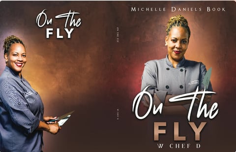 Book cover for On the Fly by Michelle Daniels and Chef D featuring two women in professional attire against a warm golden background
